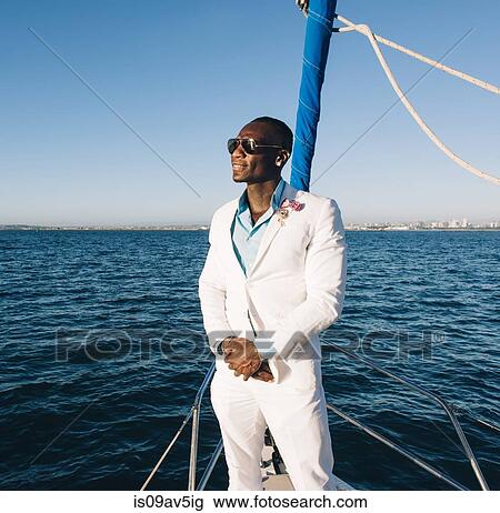 Man enjoying view on sailboat, San Diego Bay, California, USA View Large Photo Image Stock Image - Man enjoying view on sailboat, San Diego Bay, California, USA. Fotosearch