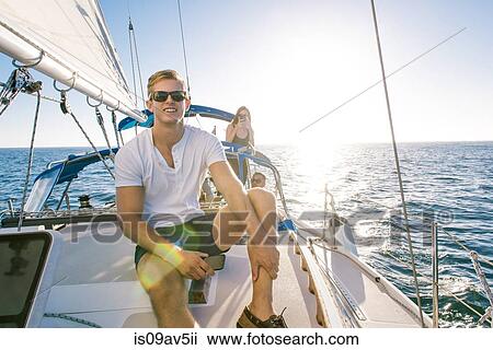 Man enjoying view on sailboat, San Diego Bay, California, USA View Large Photo Image Stock Image - Man enjoying view on sailboat, San Diego Bay, California, USA. Fotosearch