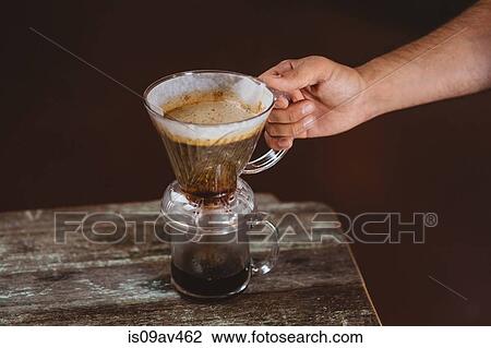 Man holding filter coffee maker View Large Photo Image Stock Image - Man holding filter coffee maker. Fotosearch