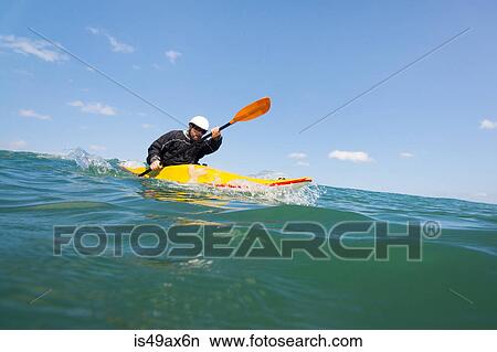 Man paddling kayak at sea, Las Huacas, Guanacaste, Costa Rica, Central America View Large Photo Image Picture - Man paddling kayak at sea, Las Huacas, Guanacaste, Costa Rica, Central America. Fotosearch