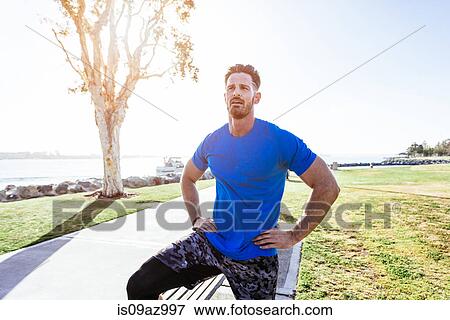 Man training, taking a break at coast, downtown San Diego, California, USA View Large Photo Image Stock Photo - Man training, taking a break at coast, downtown San Diego, California, USA. Fotosearch