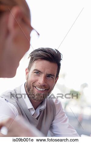 Mature man and woman, face to face, smiling View Large Photo Image Stock Image - Mature man and woman, face to face, smiling. Fotosearch