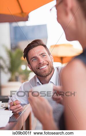 Mature man and woman, face to face, smiling View Large Photo Image Stock Image - Mature man and woman, face to face, smiling. Fotosearch