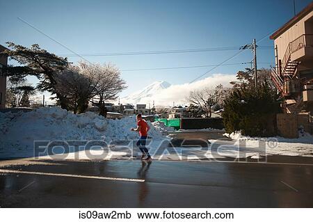 Mature man running on road in winter, Lake Kawaguchiko, Mount Fuji, Japan View Large Photo Image Stock Image - Mature man running on road in winter, Lake Kawaguchiko, Mount Fuji, Japan. Fotosearch