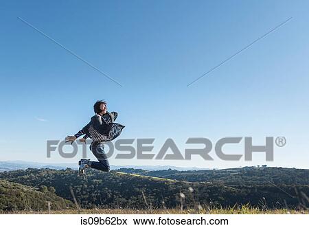 Mature woman in rural setting, jumping for joy, Paso Robles, California, USA View Large Photo Image Stock Photo - Mature woman in rural setting, jumping for joy, Paso Robles, California, USA. Fotosearch