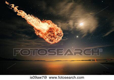 Stock Photo - Meteor falling through starry night sky over water. Fotosearch
