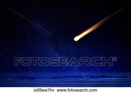 Meteor in night sky falling over ocean View Large Photo Image Stock Photo - Meteor in night sky falling over ocean. Fotosearch