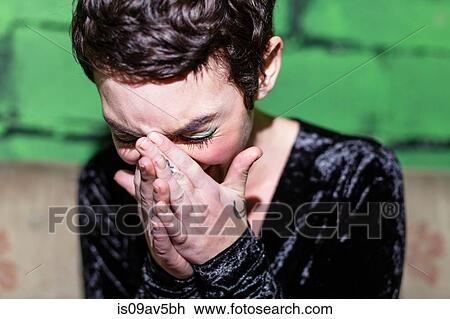 Mid adult woman with green eye-shadow, laughing View Large Photo Image Stock Image - Mid adult woman with green eye-shadow, laughing. Fotosearch