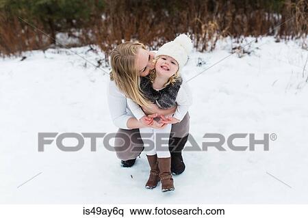 Mother and daughter in snow-covered park, Oshawa, Canada View Large Photo Image Stock Photography - Mother and daughter in snow-covered park, Oshawa, Canada. Fotosearch