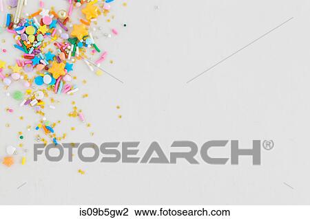 Multi-coloured multi-shaped confetti sprinkles View Large Photo Image Stock Image - Multi-coloured multi-shaped confetti sprinkles. Fotosearch