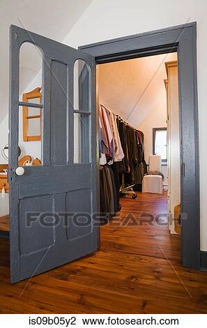 Old blue painted wooden door leading to the walk-in closet from master bedroom in reconstructed 1840s residential log home, Quebec, Canada View Large Photo Image Stock Image - Old blue painted wooden door leading to the walk-in closet from master bedroom in reconstructed 1840s residential log home, Quebec, Canada. Fotosearch