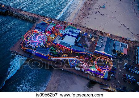 Overhead view of amusement park at dusk, Santa Monica, California, USA View Large Photo Image Stock Photo - Overhead view of amusement park at dusk, Santa Monica, California, USA. Fotosearch