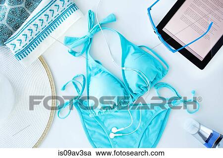Overhead view of items being prepared for beach trip View Large Photo Image Stock Image - Overhead view of items being prepared for beach trip. Fotosearch