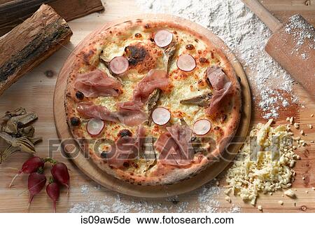 Overhead view of parma ham and radish pizza View Large Photo Image Stock Image - Overhead view of parma ham and radish pizza. Fotosearch