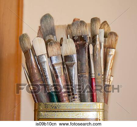 Paintbrushes in tin metal can View Large Photo Image Picture - Paintbrushes in tin metal can. Fotosearch