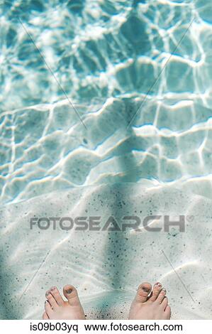Pair of feet with nail polish underwater View Large Photo Image Stock Photography - Pair of feet with nail polish underwater. Fotosearch