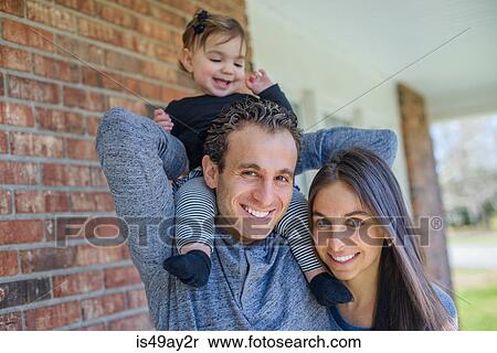 Parents and daughter outdoors View Large Photo Image Stock Photography - Parents and daughter outdoors. Fotosearch