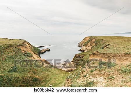 Stock Image - Path opening down to the sea, Point Arena, California, US. Fotosearch