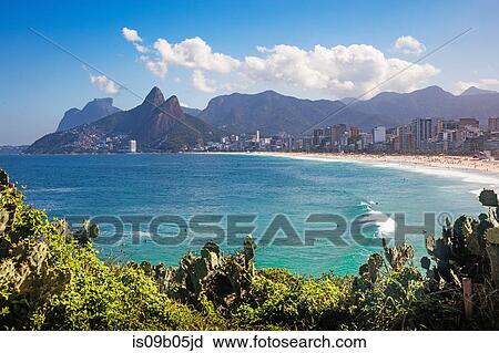 Pedra da Gavea and Morro Dois Irmaos in the distance, Arpoadors, Ipenema, Rio de Janeiro, Brazil View Large Photo Image Stock Image - Pedra da Gavea and Morro Dois Irmaos in the distance, Arpoadors, Ipenema, Rio de Janeiro, Brazil. Fotosearch