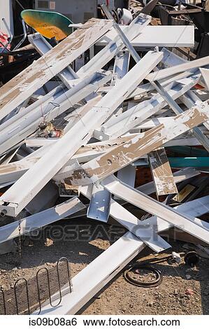 Stock Photograph - Pile of metal at scrap yard. Fotosearch