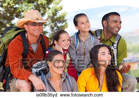 Stock Image - Portrait of adult and child hiking friends, Sedona, Arizona, USA. Fotosearch