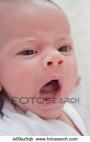 Portrait of baby boy yawning View Large Photo Image Stock Image - Portrait of baby boy yawning. Fotosearch