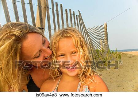 Portrait of blond haired mother and daughter at beach View Large Photo Image Stock Photo - Portrait of blond haired mother and daughter at beach. Fotosearch