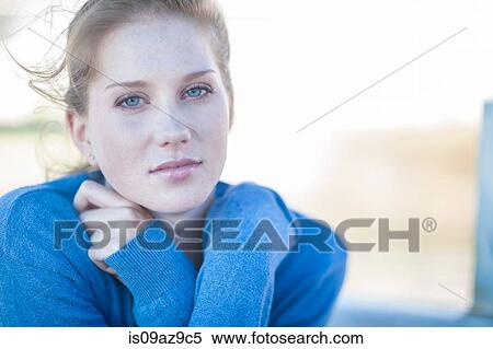 Portrait of blue eyed young woman View Large Photo Image Stock Photography - Portrait of blue eyed young woman. Fotosearch