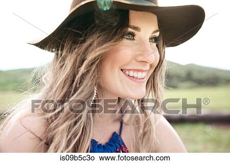 Picture - Portrait of boho style young woman in felt hat. Fotosearch