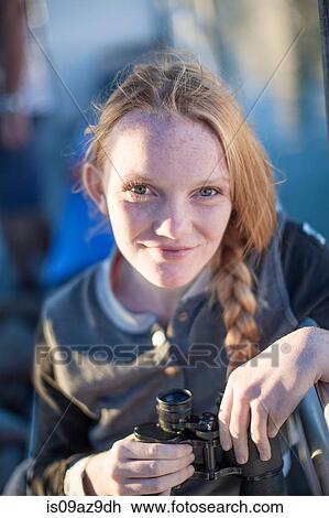 Portrait of girl with binoculars on boat trip, Cape Town, South Africa View Large Photo Image Stock Image - Portrait of girl with binoculars on boat trip, Cape Town, South Africa. Fotosearch