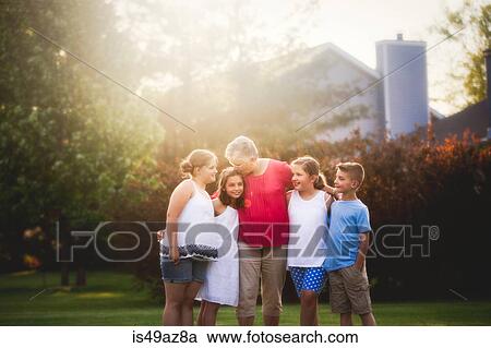 Portrait of grandmother with grandchildren View Large Photo Image Stock Image - Portrait of grandmother with grandchildren. Fotosearch