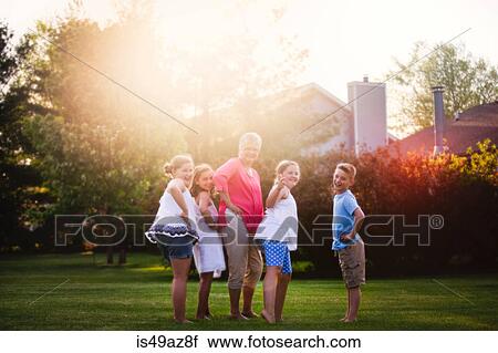 Portrait of grandmother with grandchildren View Large Photo Image Stock Image - Portrait of grandmother with grandchildren. Fotosearch