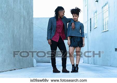 Portrait of lesbian couple, outdoors, smiling View Large Photo Image Stock Photo - Portrait of lesbian couple, outdoors, smiling. Fotosearch