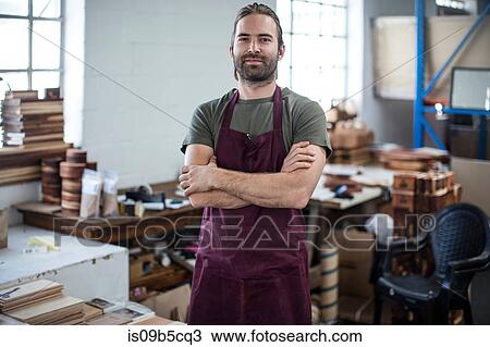 Portrait of man in wooden products factory View Large Photo Image Stock Image - Portrait of man in wooden products factory. Fotosearch