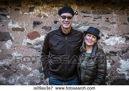 Portrait of mature couple, smiling, outdoors View Large Photo Image Stock Photo - Portrait of mature couple, smiling, outdoors. Fotosearch
