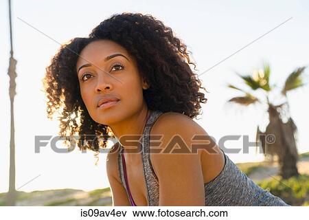 Portrait of mid adult woman, outdoors View Large Photo Image Stock Photo - Portrait of mid adult woman, outdoors. Fotosearch