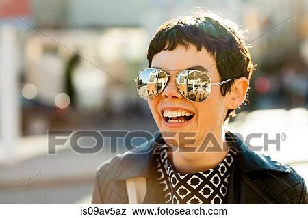 Portrait of mid adult woman, outdoors, wearing mirrored sunglasses View Large Photo Image Stock Photo - Portrait of mid adult woman, outdoors, wearing mirrored sunglasses. Fotosearch