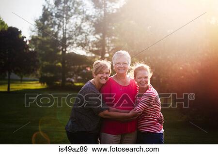 Portrait of mother and adult daughters View Large Photo Image Stock Photo - Portrait of mother and adult daughters. Fotosearch