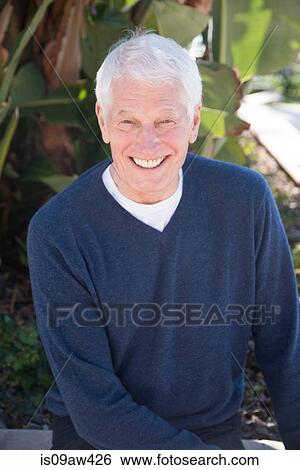 Stock Photograph - Portrait of senior man, outdoors, smiling. Fotosearch