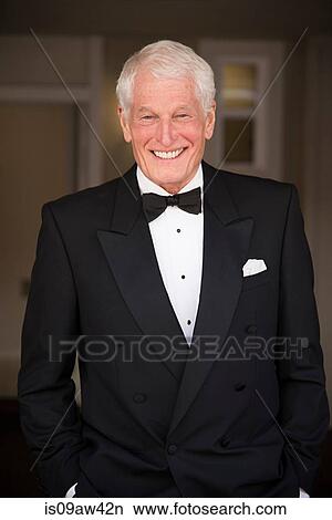Portrait of senior man wearing dinner jacket, smiling View Large Photo Image Picture - Portrait of senior man wearing dinner jacket, smiling. Fotosearch
