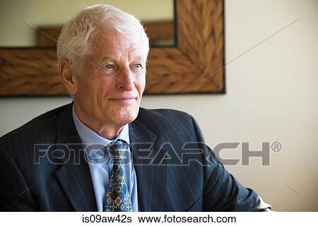 Portrait of senior man wearing suit, looking away View Large Photo Image Stock Photograph - Portrait of senior man wearing suit, looking away. Fotosearch
