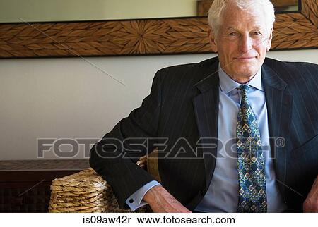 Portrait of senior man wearing suit, smiling View Large Photo Image Stock Photography - Portrait of senior man wearing suit, smiling. Fotosearch