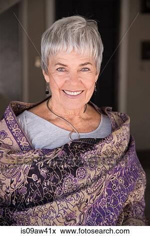 Portrait of senior woman, smiling View Large Photo Image Stock Photo - Portrait of senior woman, smiling. Fotosearch