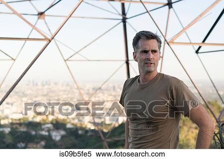 Portrait of sweating jogger looking away, Runyon Canyon, Los Angeles, California, USA View Large Photo Image Stock Photography - Portrait of sweating jogger looking away, Runyon Canyon, Los Angeles, California, USA. Fotosearch