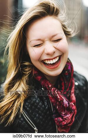 Portrait of woman eyes closed laughing View Large Photo Image Stock Image - Portrait of woman eyes closed laughing. Fotosearch