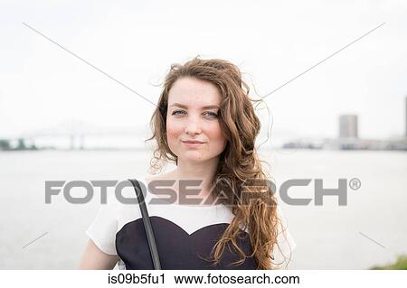 Portrait of woman in front of New orleans bridge, Mississippi river, French Quarter, New Orleans, Louisiana, USA View Large Photo Image Stock Image - Portrait of woman in front of New orleans bridge, Mississippi river, French Quarter, New Orleans, Louisiana, USA. Fotosearch