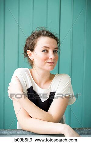 Portrait of woman looking at camera smiling View Large Photo Image Stock Photo - Portrait of woman looking at camera smiling. Fotosearch