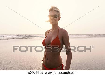 Portrait of woman on beach wearing bikini, Goa, India, Asia View Large Photo Image Stock Photograph - Portrait of woman on beach wearing bikini, Goa, India, Asia. Fotosearch