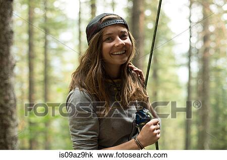 Portrait of young female climber in forest, Mount Hood National Forest, Oregon, USA View Large Photo Image Stock Image - Portrait of young female climber in forest, Mount Hood National Forest, Oregon, USA. Fotosearch
