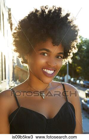 Portrait of young female fashion blogger in sunlight, New York, USA View Large Photo Image Stock Image - Portrait of young female fashion blogger in sunlight, New York, USA. Fotosearch